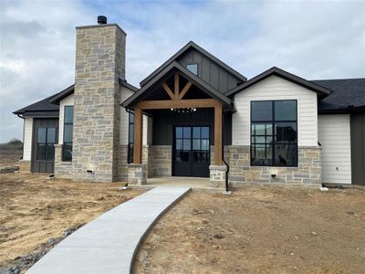 View of front of home featuring french doors