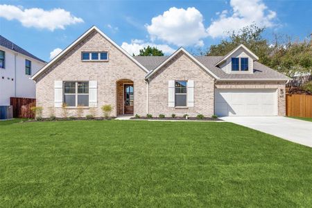 View of front of home featuring central AC unit and a front lawn