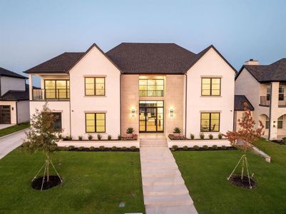 View of front of home featuring a lawn