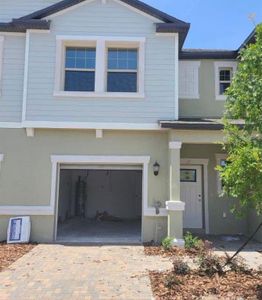 New construction Townhouse house 21869 Adriatic Lane, Land O' Lakes, FL 34637 - photo 0