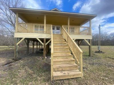 New construction Single-Family house 1048 Cypress Lakes Circle, Splendora, TX 77327 - photo 0