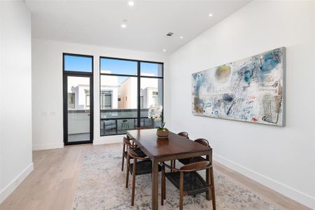 Dining space with light wood-type flooring