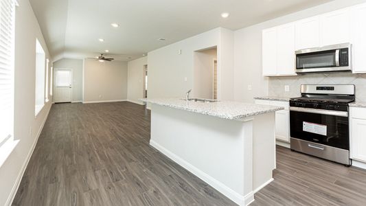 Dining Area to Kitchen and Family Room