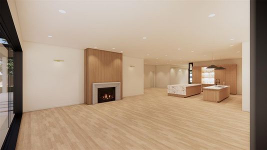 Living room angle with view of kitchen and entracne hall.