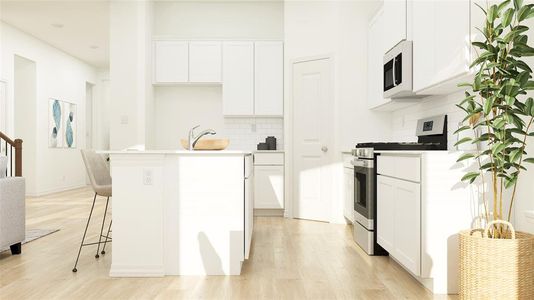 Kitchen with light wood-type flooring, white cabinetry, stainless steel appliances, backsplash, and a center island with sink