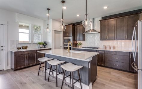 Spacious, eat-in island kitchen with abundant cabi