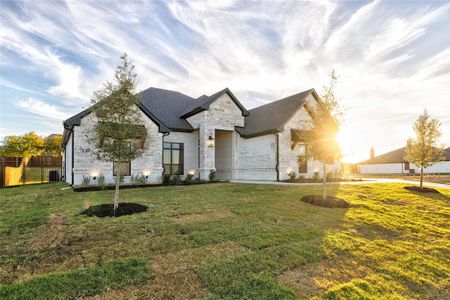 View of front of property with a front lawn