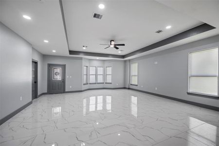 Entering the home you will love the open floor plan how it seamlessly connects the kitchen, dining, & family room with 10ft. ceilings. You will love all the modern upgrades from the tile flooring to tray ceilings.