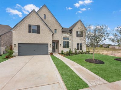 MOVE IN READY!! Westin Homes NEW Construction (Carter IX, Elevation M) Two Story. 5 bedrooms, 4.5 baths. Green grass added to enhance photo.