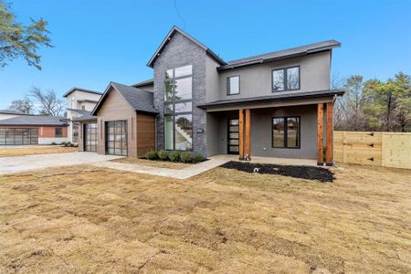 View of front of house featuring a front lawn