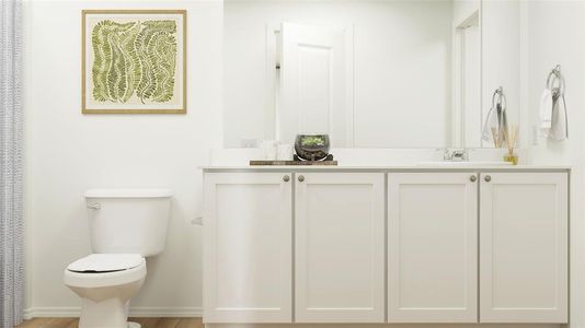 Bathroom with vanity and toilet