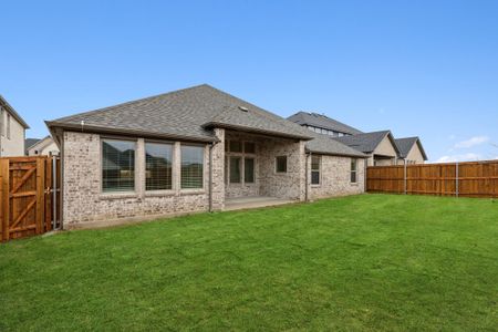 Covered Patio in the Gilmour II home plan by Trophy Signature Homes – REPRESENTATIVE PHOTO