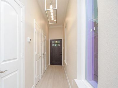 Walk in and feel the amazing height of 10ft ceilings and crown molding throughout the entire home.