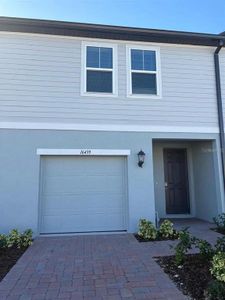 New construction Townhouse house 16439 Happy Eagle Dr, Clermont, FL 34714 - photo 0