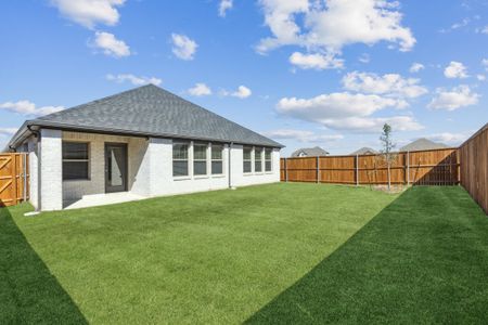 Covered Patio in the Heisman home plan by Trophy Signature Homes – REPRESENTATIVE PHOTO