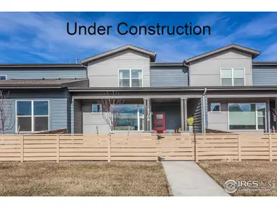 New construction Townhouse house 5086 Mckinnon Ct, Timnath, CO 80547 - photo 0