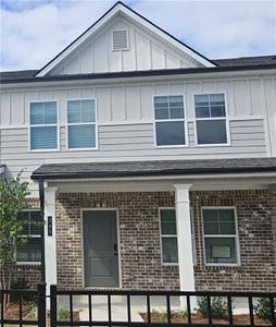 New construction Townhouse house 345 South Point Boulevard, Mcdonough, GA 30253 Easton - photo 0