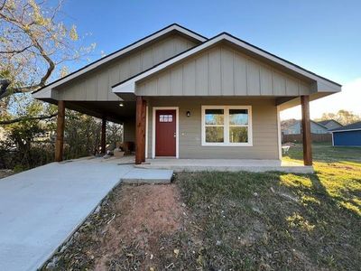 New construction Single-Family house 1230 S Travis Avenue, Denison, TX 75021 - photo 0