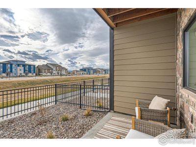 Porch w/ fenced in xeroscpaed area