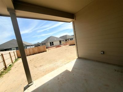 View of patio featuring a residential view and a fenced backyard