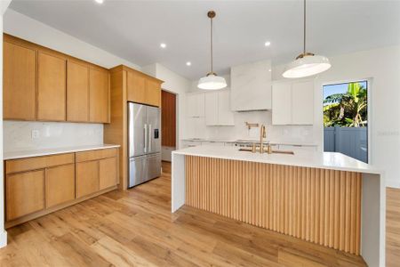 Gourmet Kitchen with waterfall island