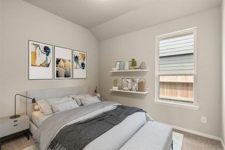 Your secondary bedroom features plush carpet, fresh paint, closet, and a large window that lets in plenty of natural lighting.