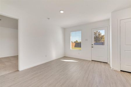 Foyer with light wood-type flooring