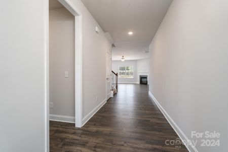 Foyer into Family Room. Photo representation. Colors and options will differ.