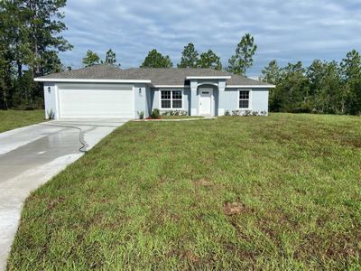 New construction Single-Family house 2560 W Windchime Loop, Citrus Springs, FL 34434 - photo 0