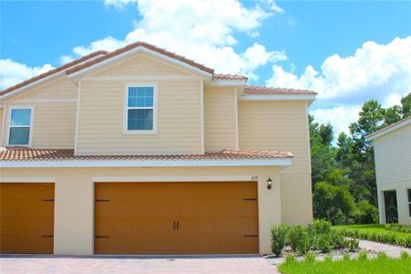 New construction Townhouse house 619 Bay Leaf Drive, Poinciana, FL 34759 Glade- photo 0