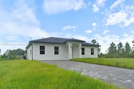New construction Single-Family house 710 Peacock Ave, Lehigh Acres, FL 33974 - image