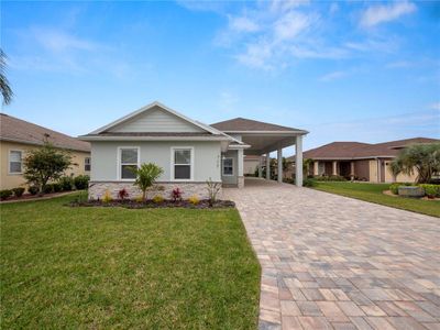 New construction Single-Family house 715 Teaberry Trail, Polk City, FL 33868 - photo 0