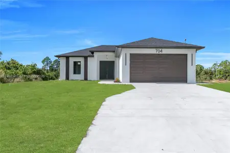 New construction Single-Family house 704 Holmes Ave, Lehigh Acres, FL 33974 - image