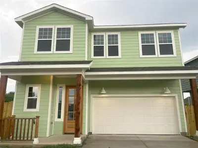 View of front of property with an attached garage, concrete driveway, and covered porch View of front of property with an attached garage, concrete driveway, and covered porch