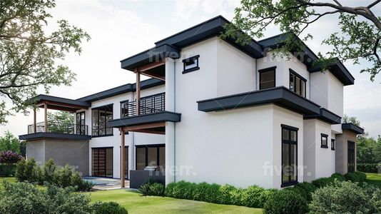 Rear view of house with a yard and a balcony