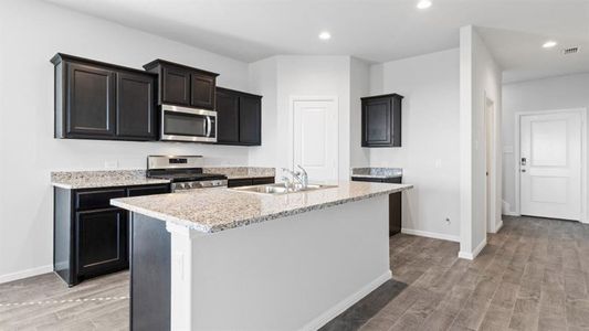 Kitchen - All Home and community information, including pricing, included features, terms, availability and amenities, are subject to change at any time without notice or obligation. All Drawings, pictures, photographs, video, square footages, floor plans, elevations, features, colors and sizes are approximate for illustration purposes only and will vary from the homes as built.