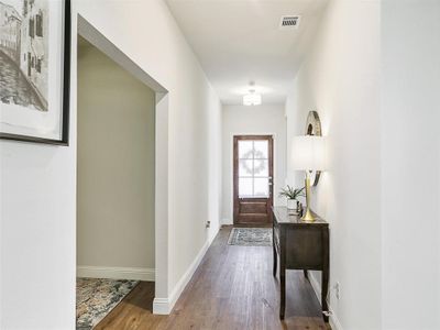 Doorway & entry with wood-type flooring