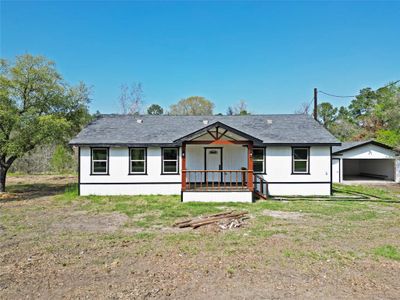 New construction Single-Family house 11 Pine Knot Square, Huntsville, TX 77320 - photo 0