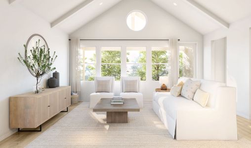 Great room with high ceilings and white painted ceiling beams