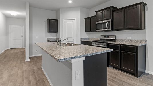 Kitchen - All Home and community information, including pricing, included features, terms, availability and amenities, are subject to change at any time without notice or obligation. All Drawings, pictures, photographs, video, square footages, floor plans, elevations, features, colors and sizes are approximate for illustration purposes only and will vary from the homes as built.