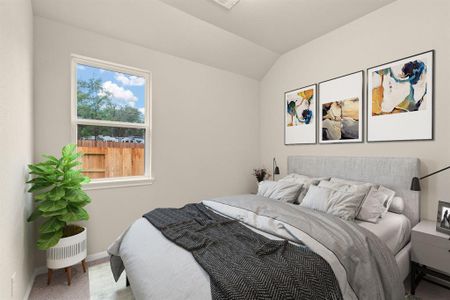 Your secondary bedroom features plush carpet, fresh paint, closet, and a large window that lets in plenty of natural lighting.