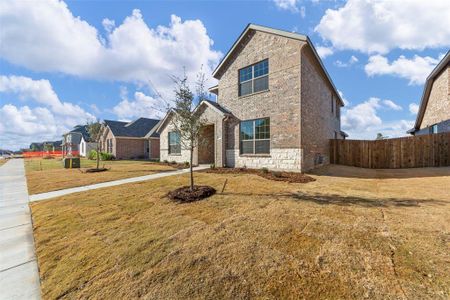 View of front of home featuring a front lawn