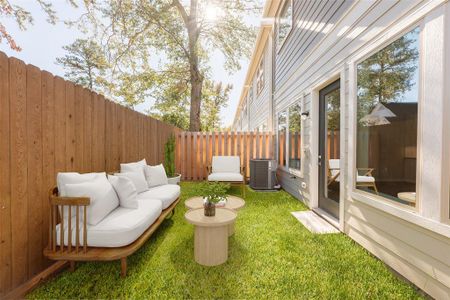 Super cute private backyard with sod grass. (virtually staged)