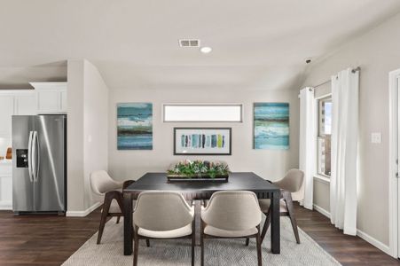 Dining Room in the Heisman home plan by Trophy Signature Homes – REPRESENTATIVE PHOTO