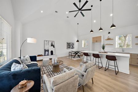 Another vantage point of this magnificent living/dining/kitchen space!