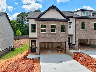 New construction Townhouse house 5720 Urban Village Wy, Unit 7, Tucker, GA 30084 Evergreen- photo 0