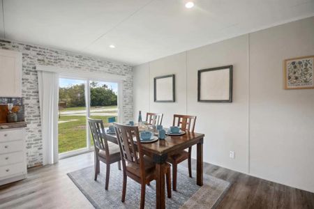 Dining room with light wood-type flooring