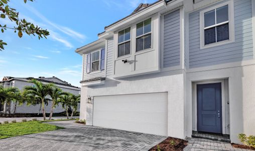 New construction Townhouse house 678 NE Waters Edge Lane, Port Saint Lucie, FL 34983 - photo 0