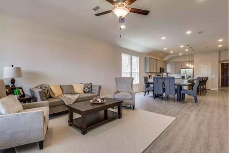 Photo of Pulte model home with same floor plan, not of actual home listed.