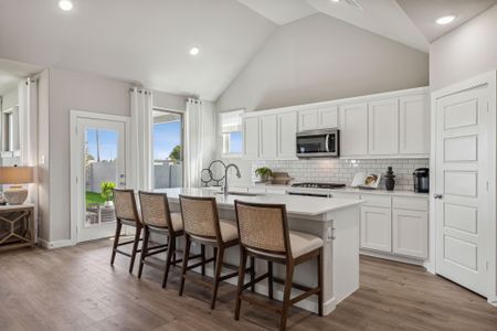 Kitchen in the Wimbledon home plan by Trophy Signature Homes